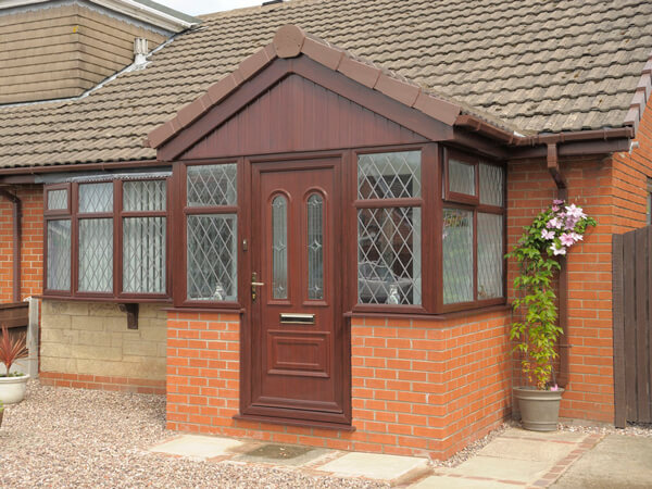 Entrance Porch in Brick & Rosewwod UPVC Frames